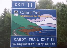 Cabot Trail exit sign: 'Experience the Masterpiece'