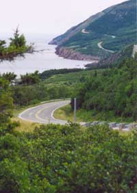 Cabot Trail rolling along the west Cape Breton coast, ocean on left