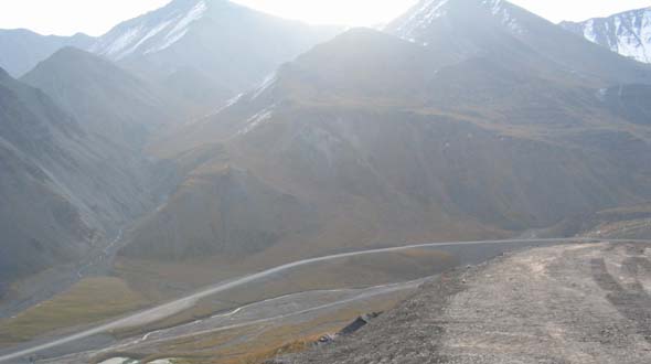 Dalton Highway northbound, descending from Atigun Pass summit