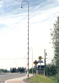 Light pole with candy-cane striping