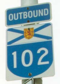 NS 102 outbound, closeup of arterial route marker with 'Outbound' banner