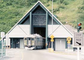 East tunnel portal, as train emerges from the tunnel toward the Whittier docks